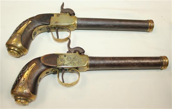 A cased pair of early 19th century brass mounted boxlock pistols, 10in., cased with brass powder horn